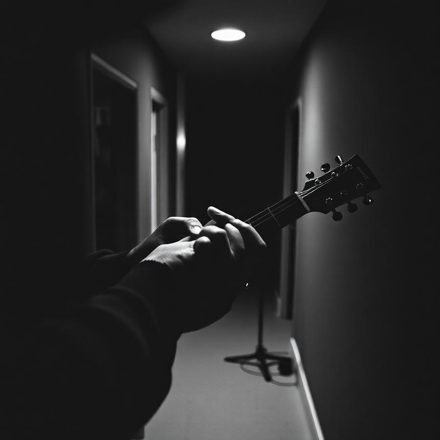 Backstage, tuning the guitar